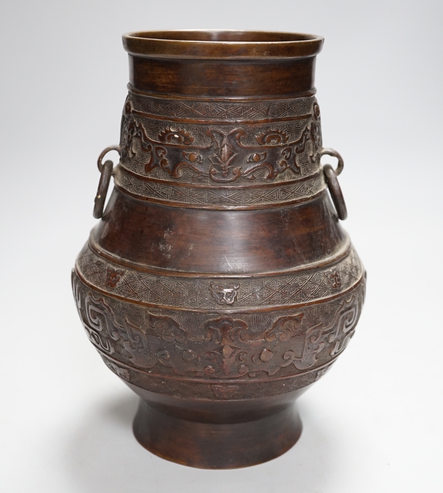 A Chinese archaistic bronze vase, hu, Xuande mark, 19th century, 24cm high